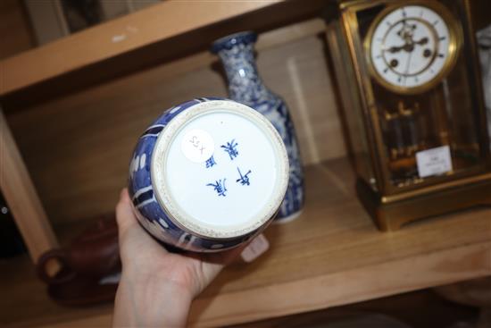 A pair of 19th century Chinese blue and white vases height 30cm